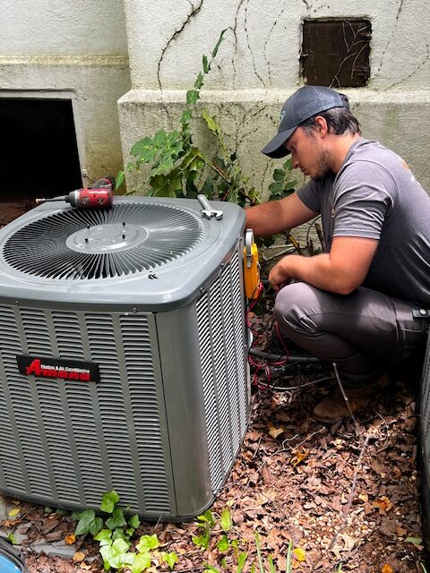 Technician Provides Professional HVAC Services.